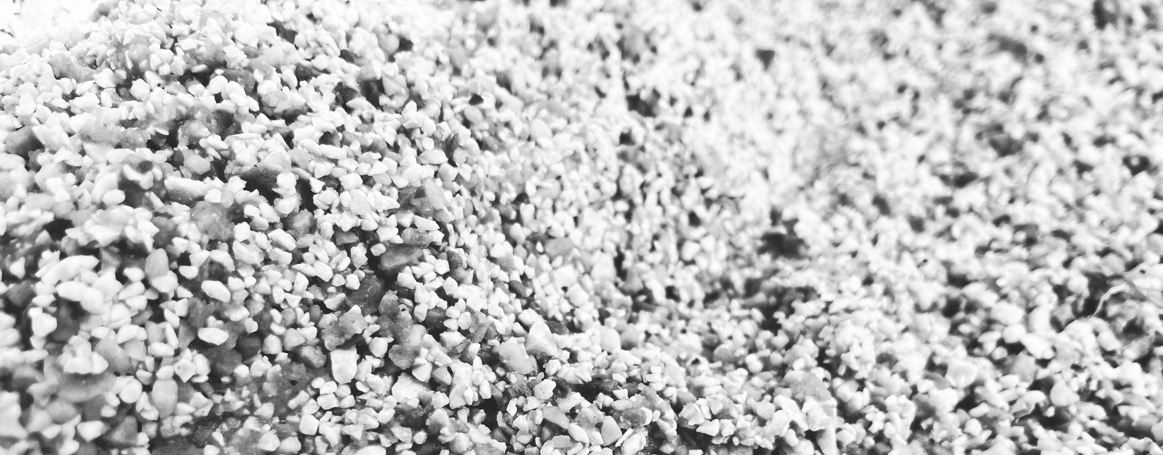 Background footer image showing greyed out resin